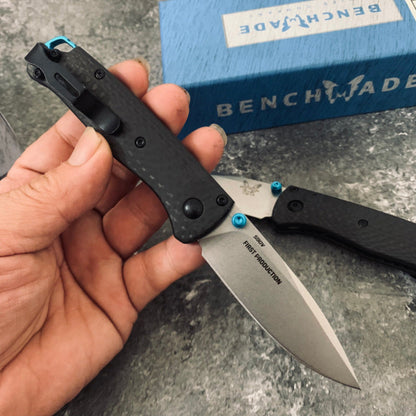 Ball-bearing folding knife with carbon fiber handle and S90V steel blade—a high-hardness, portable, multi-functional tool for camping and outdoor use.